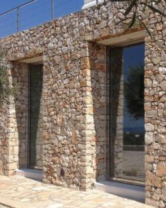 polished stainless steel windows to private villa 