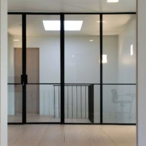 steel framed pivot door in screen