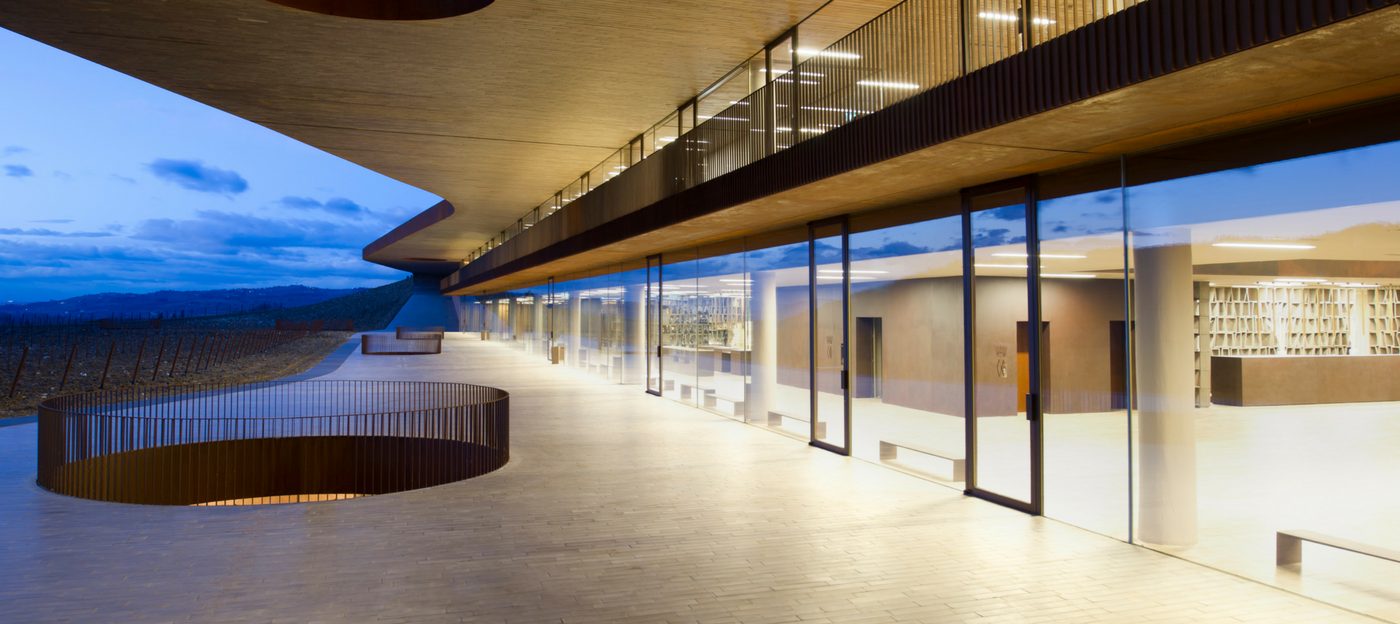 steel framed doors in frameless glass facade